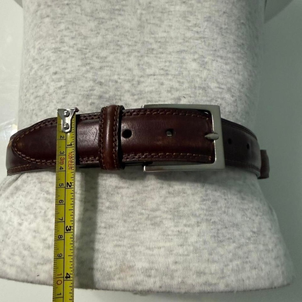 Brown leather belt with silver buckle 44"